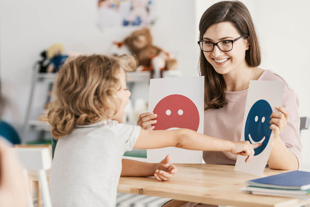 photo of woman working with child