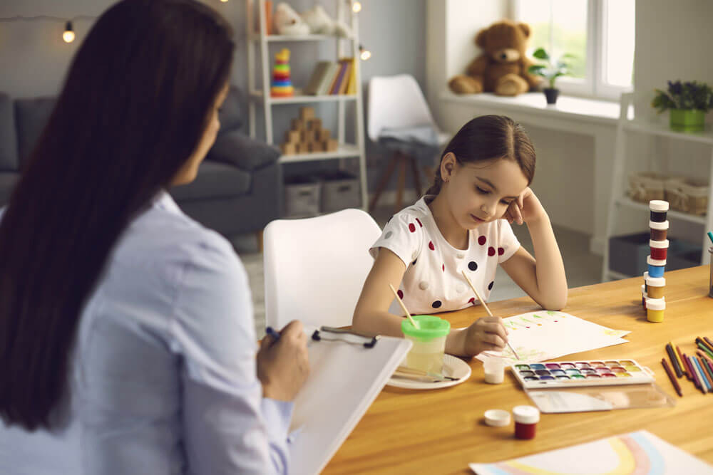 woman sitting with little girl