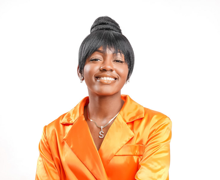 Shalisa Salters image, wearing orange jacket